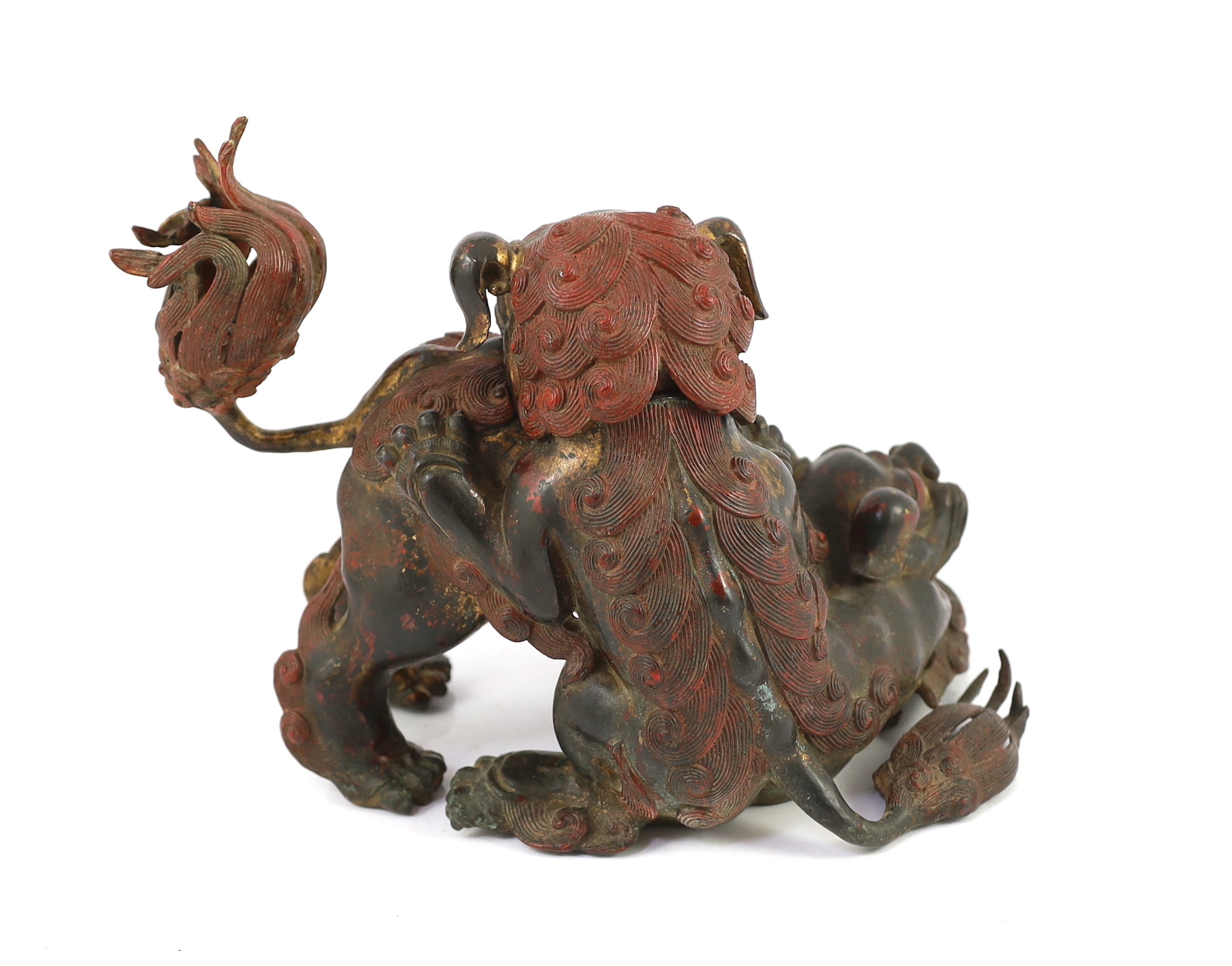 A large Japanese gilt and red lacquered bronze ‘shi-shi’ koro and cover, Edo period